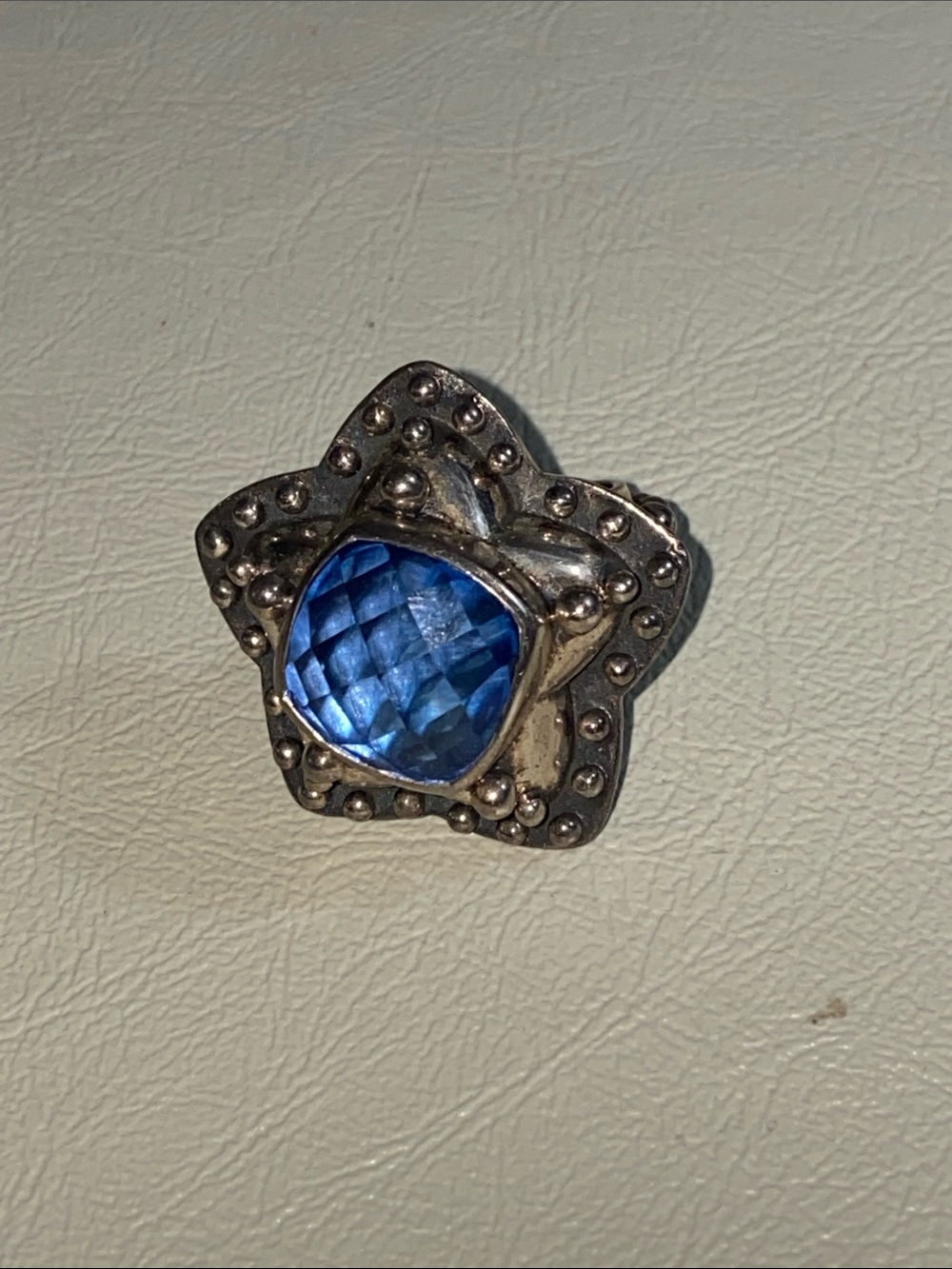 Amy Khan Russell Star-Shaped 925 Silver Ring with Faceted Blue Stone